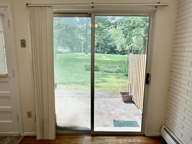 24 Woodward Ave Apt 19, New Haven, CT 06512 - entryway with baseboard heating and wood finished floors