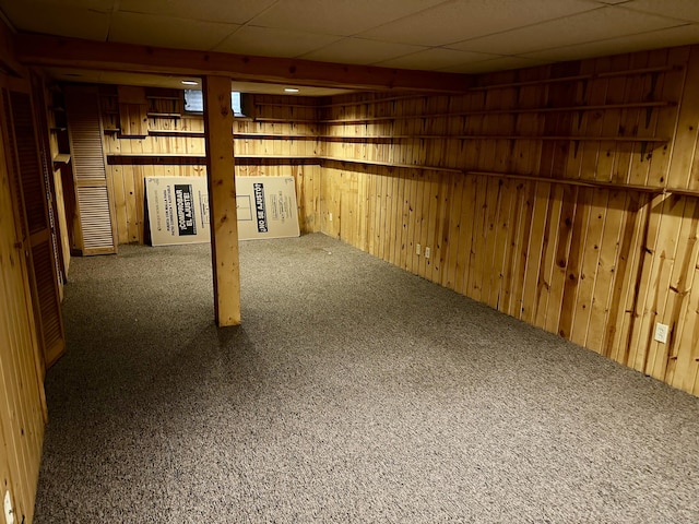 24 Woodward Ave Apt 19, New Haven, CT 06512 - finished below grade area with carpet, wooden walls, and a paneled ceiling