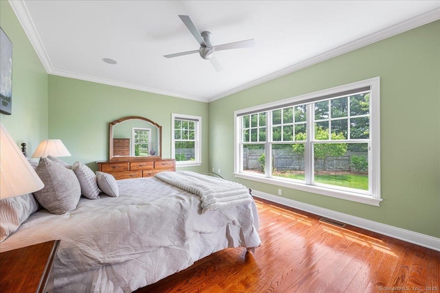 1 Osprey Commons S, Clinton, CT 06413 - bedroom featuring baseboards, wood finished floors, ornamental molding, and ceiling fan