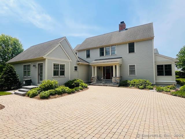 1 Osprey Commons S, Clinton, CT 06413 - view of front of house with a chimney