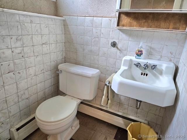 20 Kimball Rd, Wethersfield, CT 06109 - bathroom with baseboard heating and tile walls