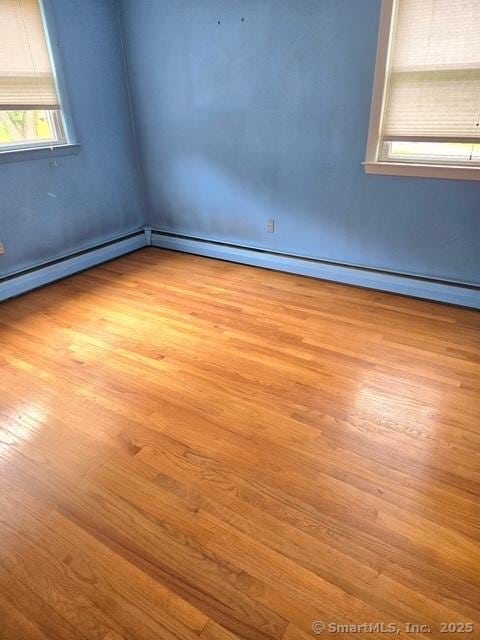 20 Kimball Rd, Wethersfield, CT 06109 - unfurnished room featuring wood finished floors and baseboard heating