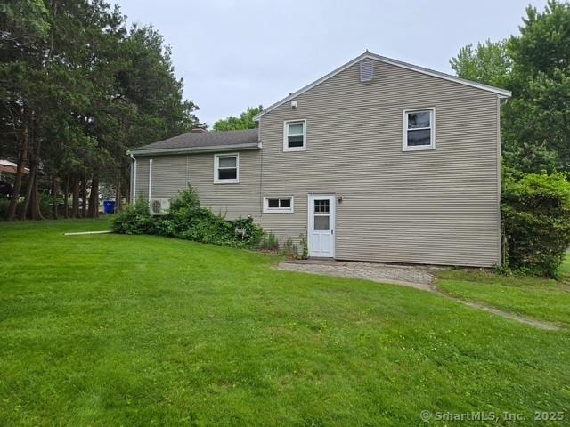 20 Kimball Rd, Wethersfield, CT 06109 - back of property featuring a yard