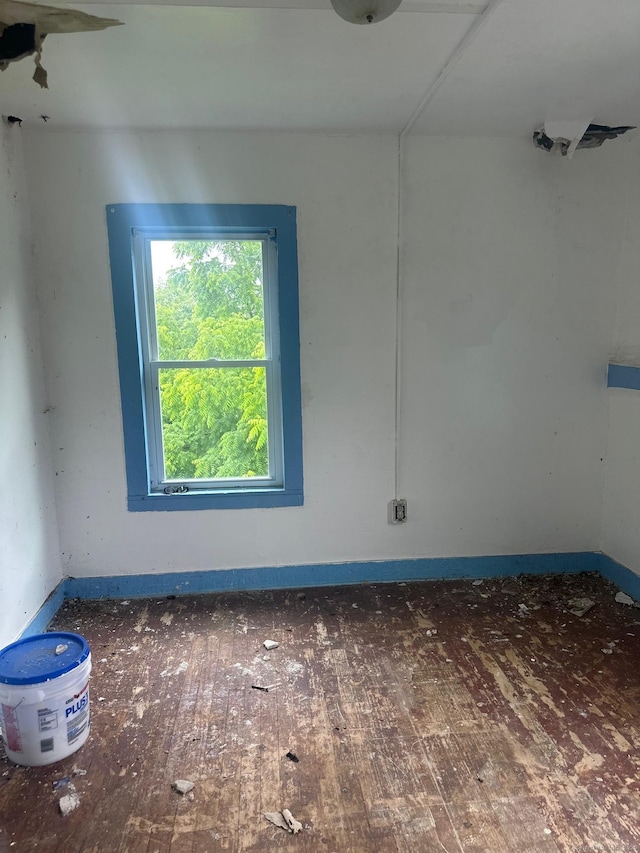 57 Chapman St, Windham, CT 06226 - unfurnished room with wood finished floors and baseboards
