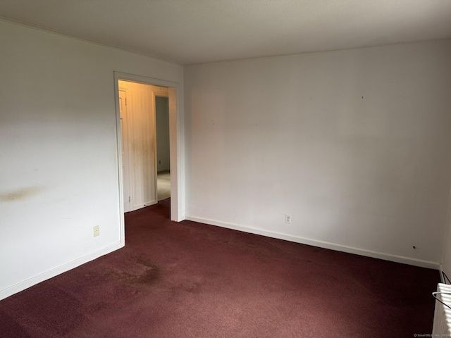52 Robin Rd Apt B1, West Hartford, CT 06119 - spare room with dark colored carpet and baseboards