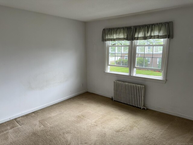 52 Robin Rd Apt B1, West Hartford, CT 06119 - unfurnished room with radiator, carpet, and baseboards