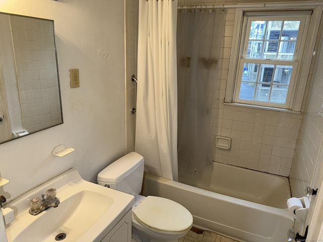 52 Robin Rd Apt B1, West Hartford, CT 06119 - bathroom featuring toilet, shower / bath combination with curtain, and vanity