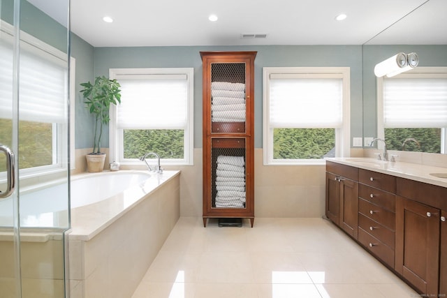11 Old Hill Rd, Westport, CT 06880 - full bath with double vanity, a bath, recessed lighting, and tile patterned flooring