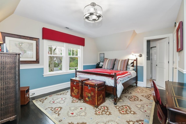 11 Old Hill Rd, Westport, CT 06880 - bedroom with lofted ceiling, wood finished floors, and a chandelier