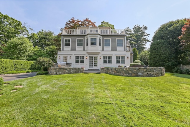 11 Old Hill Rd, Westport, CT 06880 - view of front of home featuring a balcony, a front yard, and entry steps