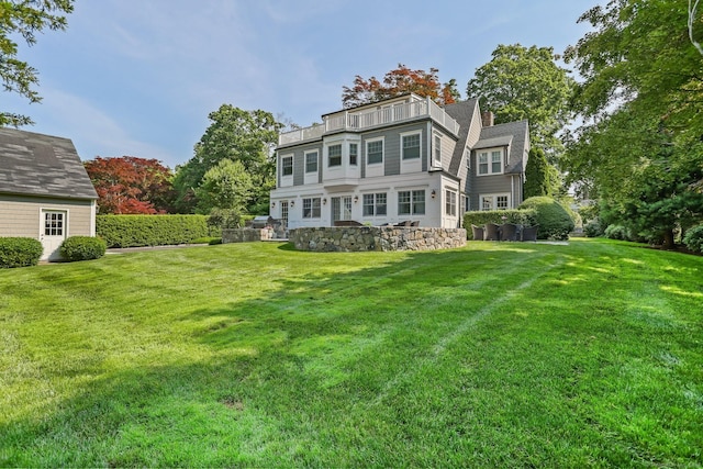 11 Old Hill Rd, Westport, CT 06880 - back of property featuring a lawn and a balcony
