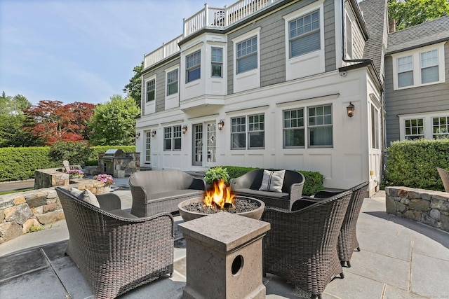 11 Old Hill Rd, Westport, CT 06880 - view of patio featuring french doors, a grill, and an outdoor living space with a fire pit