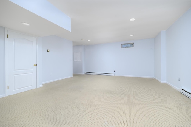668 Glenbrook Rd Unit 9, Stamford, CT 06906 - basement featuring a baseboard radiator, light carpet, baseboards, and recessed lighting