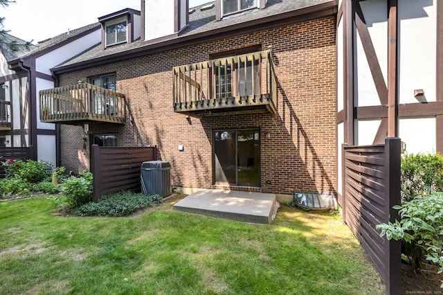668 Glenbrook Rd Unit 9, Stamford, CT 06906 - rear view of property featuring central AC, a balcony, brick siding, and a shingled roof