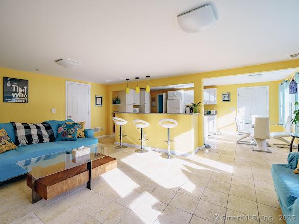 847 Glenbrook Rd, Orange, CT 06477 - living room with light tile patterned floors