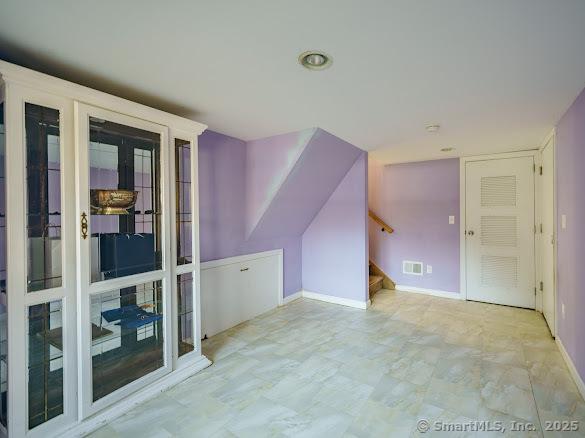 847 Glenbrook Rd, Orange, CT 06477 - bonus room with stairway and french doors