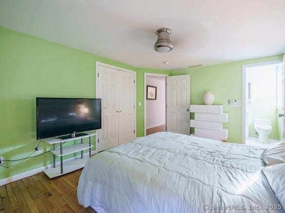847 Glenbrook Rd, Orange, CT 06477 - bedroom featuring wood finished floors and a closet
