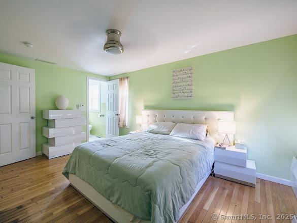 847 Glenbrook Rd, Orange, CT 06477 - bedroom with wood finished floors