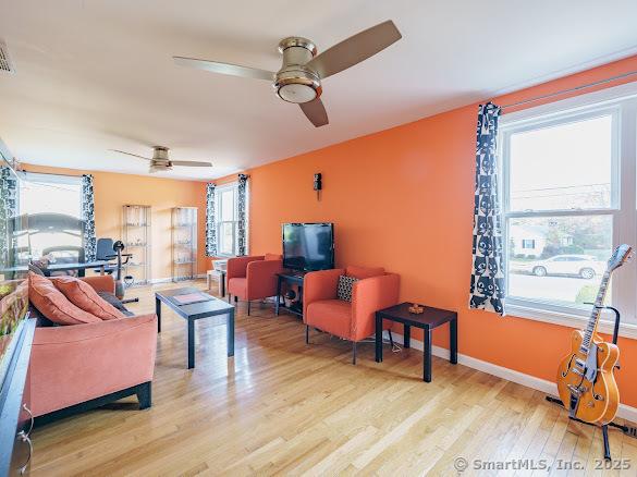 847 Glenbrook Rd, Orange, CT 06477 - living room with ceiling fan and light wood finished floors