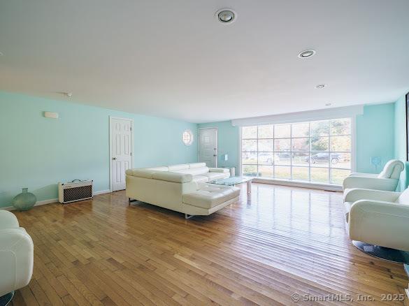 847 Glenbrook Rd, Orange, CT 06477 - living area with wood finished floors and recessed lighting