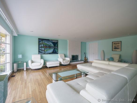 847 Glenbrook Rd, Orange, CT 06477 - living room featuring light wood finished floors and baseboards