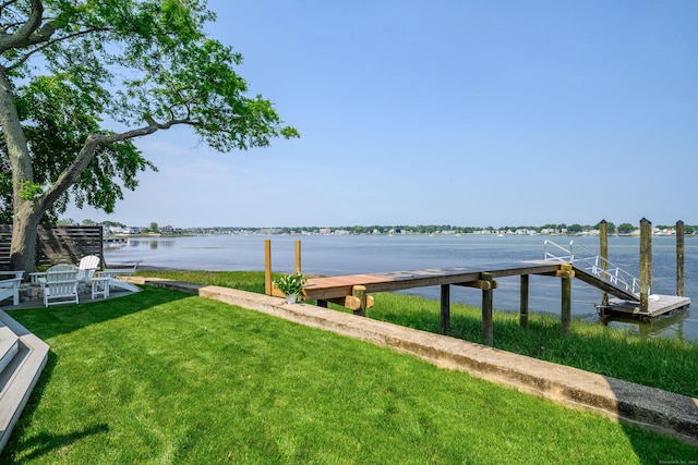 13 Seabreeze Pl, Norwalk, CT 06854 - dock with a water view and a lawn