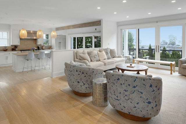47 Pine Point Rd, Norwalk, CT 06853 - living area with light wood-style flooring and recessed lighting