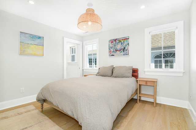 47 Pine Point Rd, Norwalk, CT 06853 - bedroom with light wood finished floors and recessed lighting