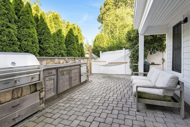 47 Pine Point Rd, Norwalk, CT 06853 - view of patio featuring an outdoor kitchen