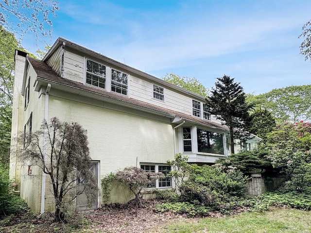 206 Peddlers Rd, Guilford, CT 06437 - view of side of property featuring a chimney and brick siding