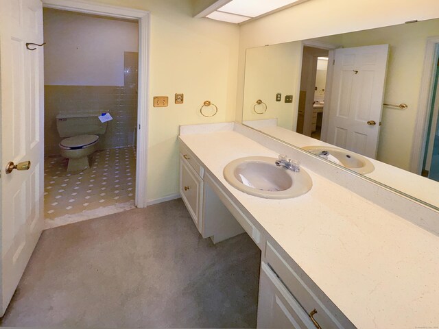 206 Peddlers Rd, Guilford, CT 06437 - bathroom featuring vanity, toilet, and tile walls