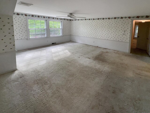 206 Peddlers Rd, Guilford, CT 06437 - unfurnished room with wallpapered walls, a ceiling fan, and carpet