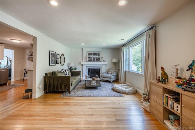 60 Davenport Rd, West Hartford, CT 06110 - living area with a fireplace, light wood finished floors, and recessed lighting