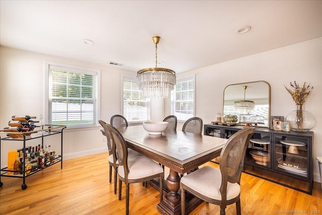 60 Davenport Rd, West Hartford, CT 06110 - dining area with a chandelier, light wood-style flooring, and recessed lighting