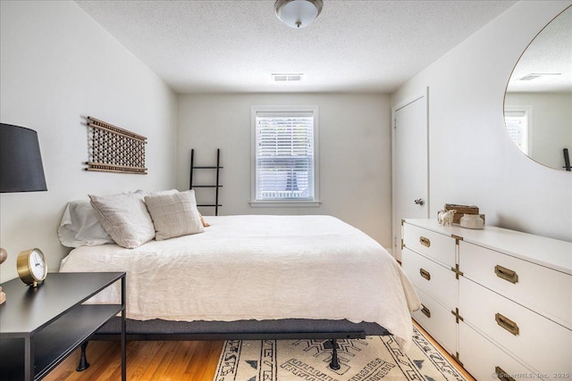 60 Davenport Rd, West Hartford, CT 06110 - bedroom featuring light wood finished floors and a textured ceiling
