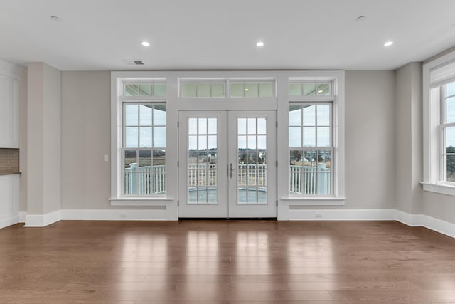 66 High St Unit 36, Guilford, CT 06437 - doorway to outside with wood finished floors, french doors, baseboards, and recessed lighting