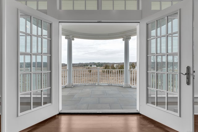 66 High St Unit 36, Guilford, CT 06437 - doorway to outside featuring wood finished floors and ornate columns