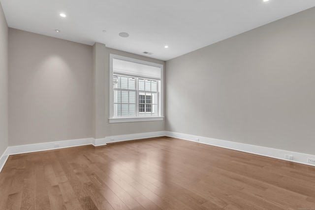66 High St Unit 36, Guilford, CT 06437 - unfurnished room featuring wood finished floors, baseboards, and recessed lighting