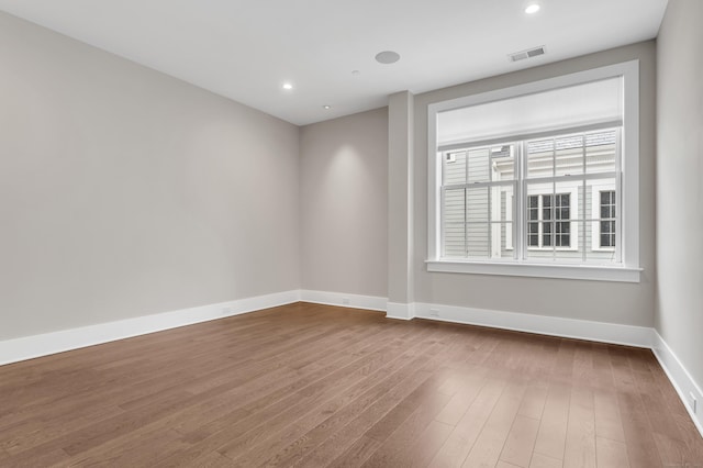 66 High St Unit 36, Guilford, CT 06437 - unfurnished room with baseboards, wood finished floors, and recessed lighting