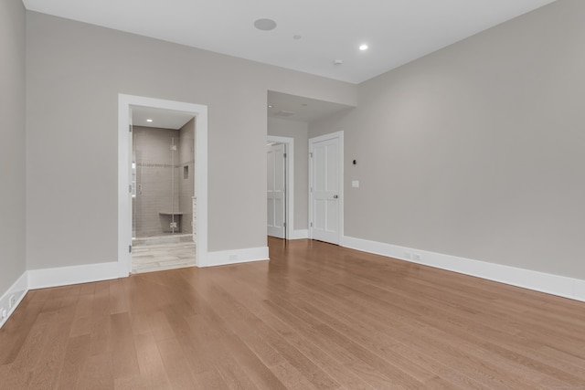 66 High St Unit 36, Guilford, CT 06437 - unfurnished room with wood finished floors, baseboards, and recessed lighting