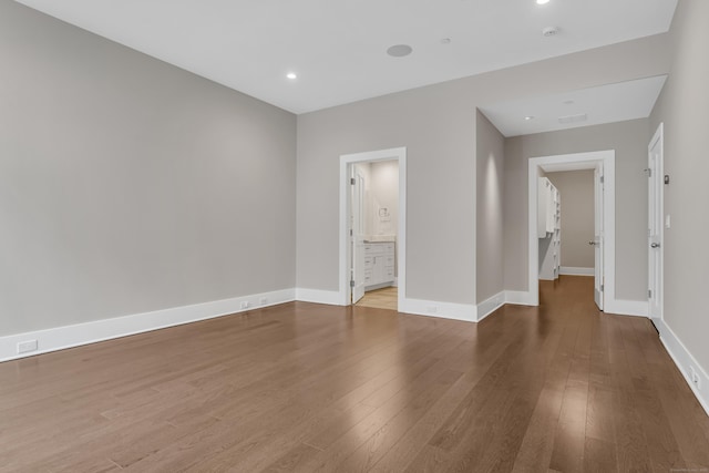 66 High St Unit 36, Guilford, CT 06437 - spare room featuring hardwood / wood-style flooring, baseboards, recessed lighting, and a smoke detector