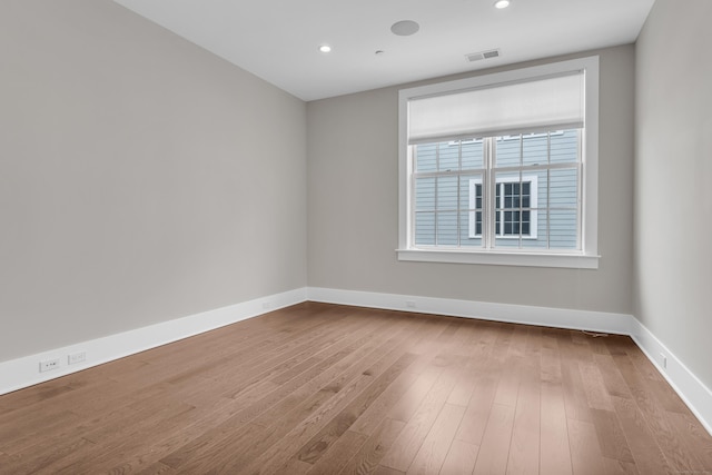 66 High St Unit 36, Guilford, CT 06437 - unfurnished room with baseboards, wood finished floors, and recessed lighting