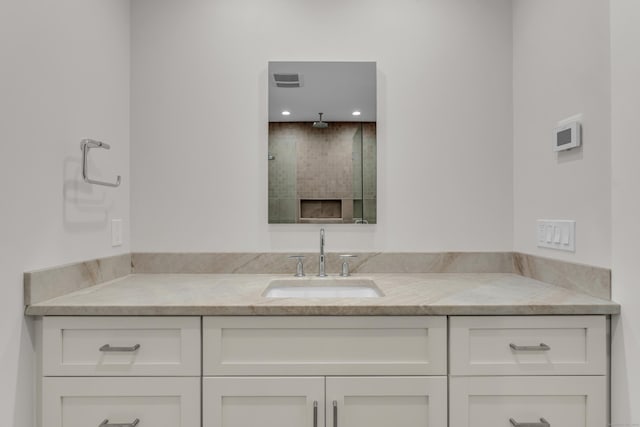 66 High St Unit 36, Guilford, CT 06437 - bathroom with vanity, tiled shower, and recessed lighting