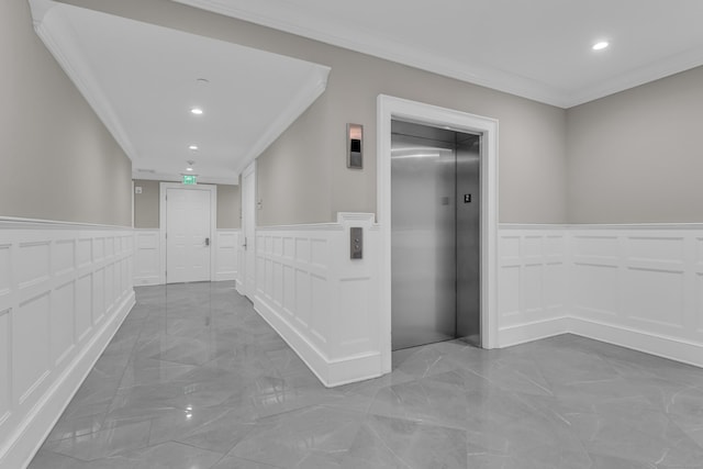 66 High St Unit 36, Guilford, CT 06437 - corridor with a decorative wall, elevator, marble tiled flooring, ornamental molding, and recessed lighting