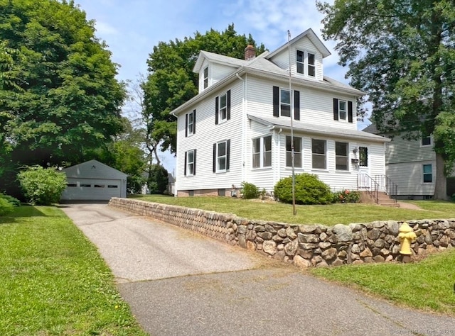 46 Glenwood St, Manchester, CT 06040 - american foursquare style home with an outbuilding, a garage, a chimney, and a front lawn