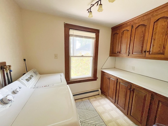 46 Glenwood St, Manchester, CT 06040 - laundry area featuring baseboard heating, independent washer and dryer, cabinet space, light flooring, and track lighting