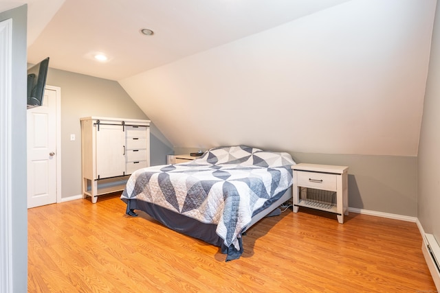 28 Hope Hill Rd, Wallingford, CT 06492 - bedroom with vaulted ceiling, light wood-style floors, recessed lighting, and a baseboard heating unit