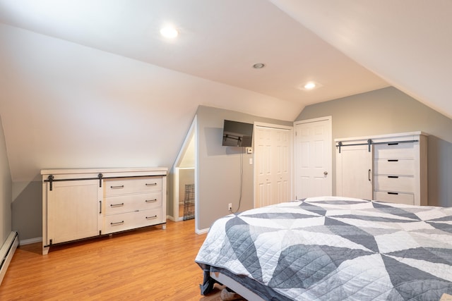 28 Hope Hill Rd, Wallingford, CT 06492 - bedroom featuring light wood-type flooring, a baseboard radiator, lofted ceiling, recessed lighting, and a closet