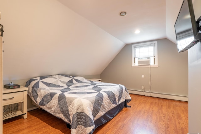 28 Hope Hill Rd, Wallingford, CT 06492 - bedroom with a baseboard heating unit, cooling unit, light wood-type flooring, lofted ceiling, and recessed lighting