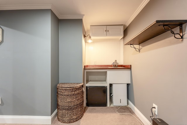 28 Hope Hill Rd, Wallingford, CT 06492 - laundry room with ornamental molding and carpet